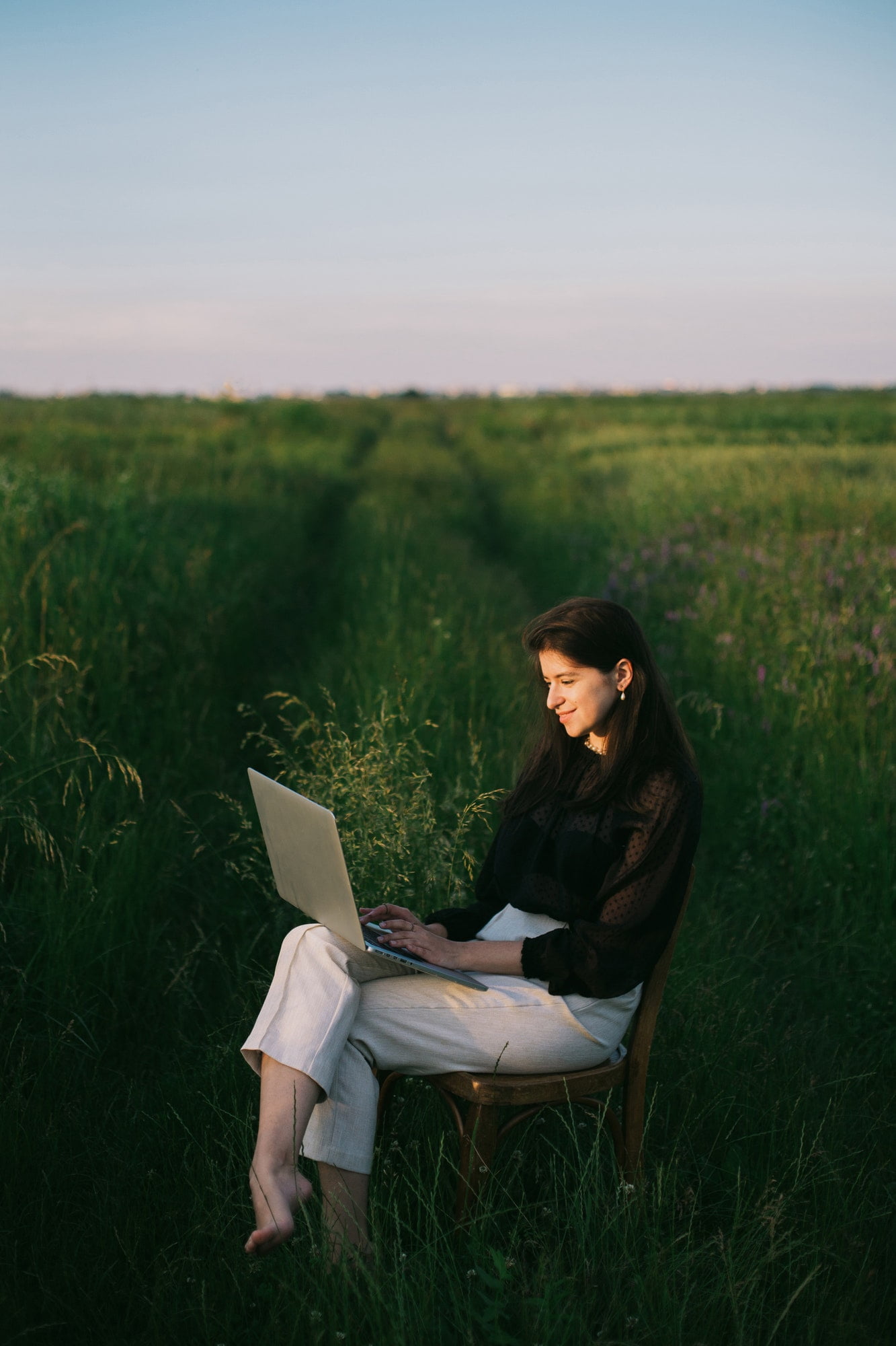 Young business woman working online